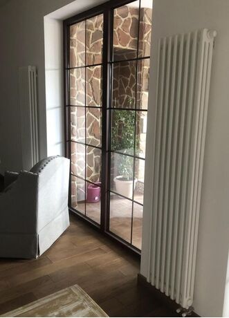 Вертикальный 3-хтрубный радиатор Purmo Delta Laserline