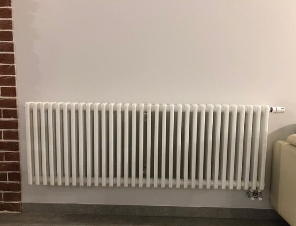 Горизонтальный 3-трубный радиатор Purmo Delta Laserline